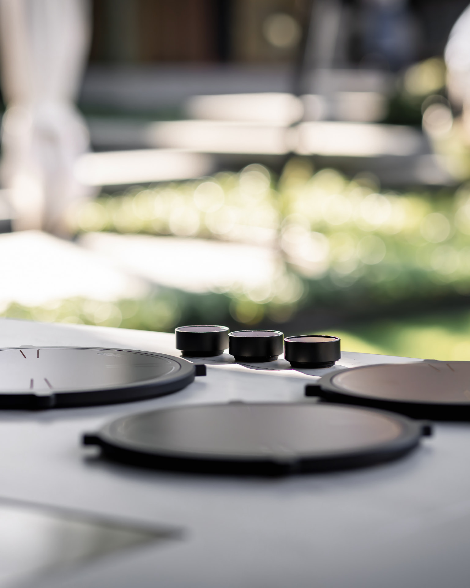 PITT Cooking induction burners and controls set into an outdoor counter